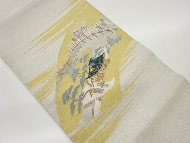 地紙に民家・橋・人物模様織出し名古屋帯